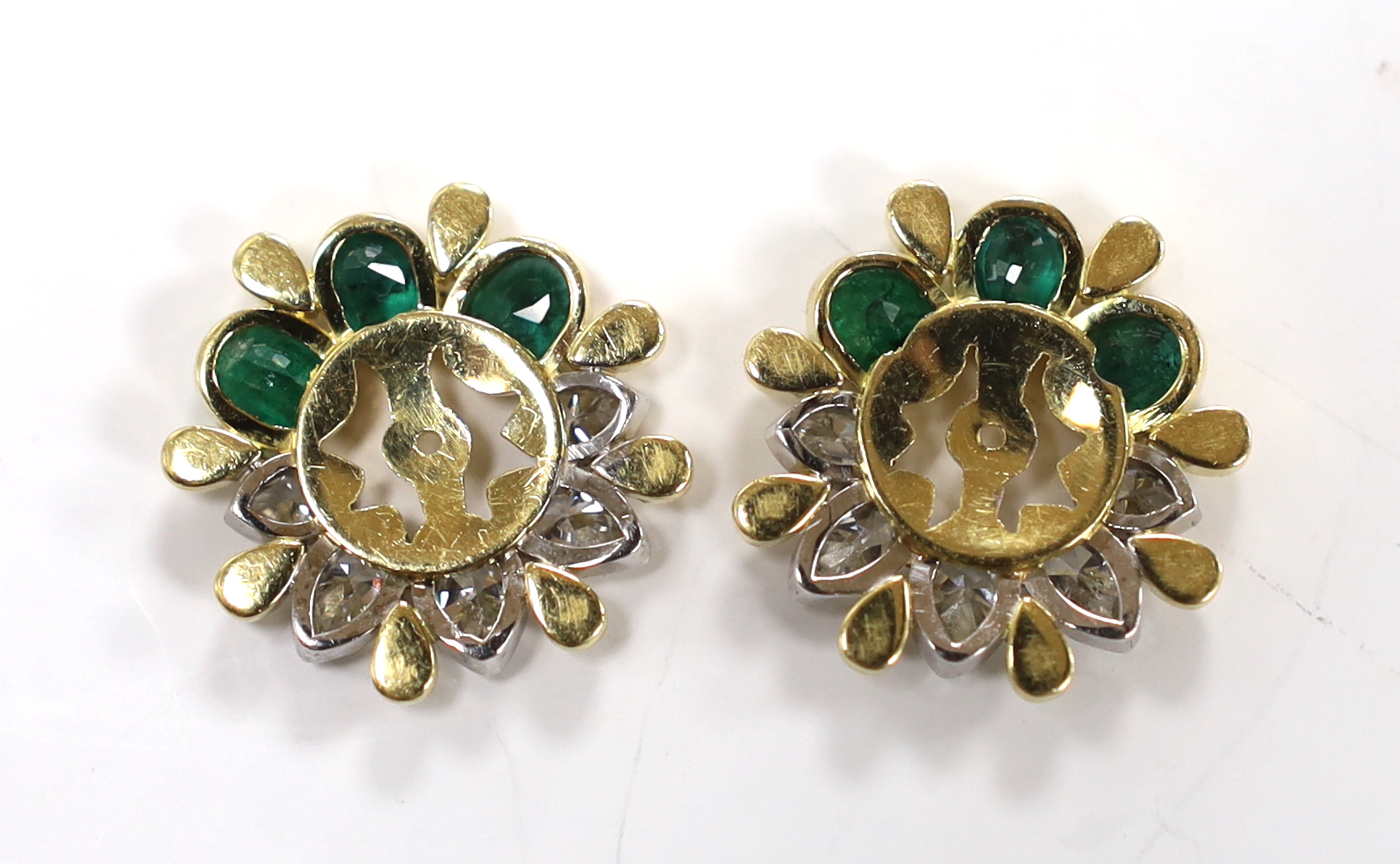 A modern pair of yellow metal, emerald and diamond cluster set circular earring attachments or surrounds, 20mm, gross weight 11.8 grams.